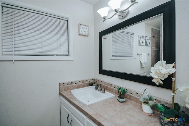 2303 Terrace Ave, Victoria, TX 77901 - full bathroom featuring walk in shower, a notable chandelier, and vanity