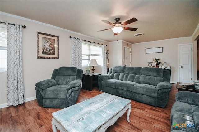 2303 Terrace Ave, Victoria, TX 77901 - living room with ornamental molding, baseboards, a ceiling fan, and wood finished floors