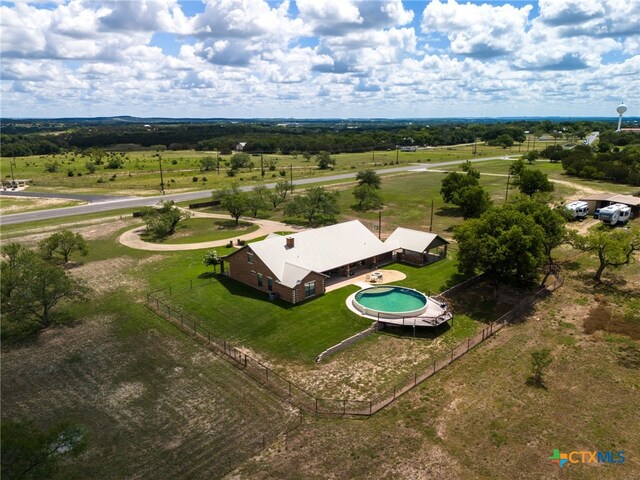 birds eye view of property featuring a rural view