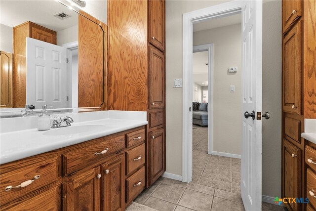 bathroom featuring vanity and tile patterned floors