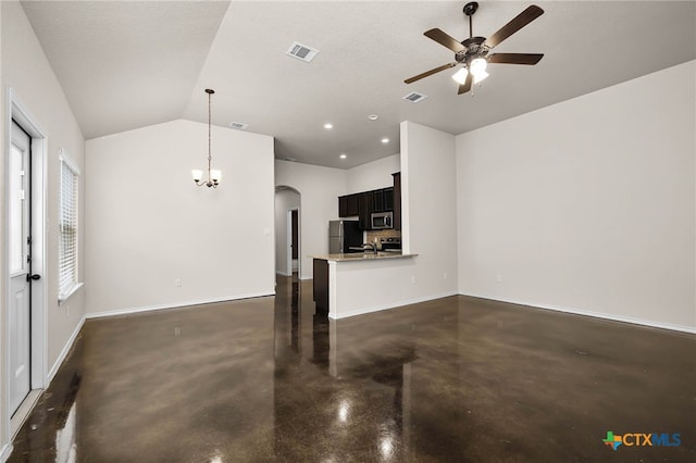 unfurnished living room with lofted ceiling, sink, ceiling fan with notable chandelier, and a textured ceiling