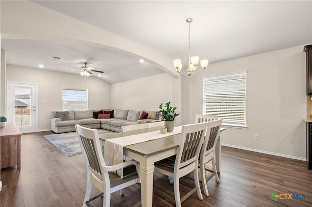 2520 Cortona St, Harker Heights, TX 76548 - dining room with ceiling fan, dark wood finished floors, a chandelier, recessed lighting, and arched walkways