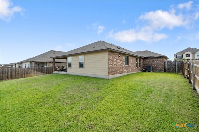 2520 Cortona St, Harker Heights, TX 76548 - rear view of house with brick siding, a fenced backyard, and a patio