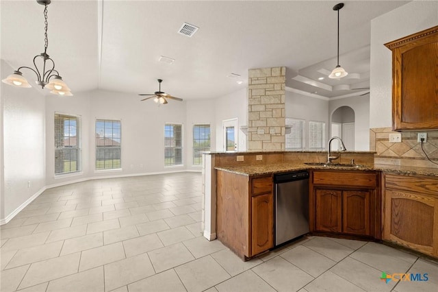 5620 Drystone Ln, Killeen, TX 76542 - kitchen with stainless steel dishwasher, a sink, brown cabinetry, and open floor plan