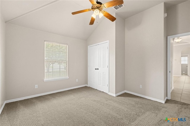 5620 Drystone Ln, Killeen, TX 76542 - unfurnished bedroom featuring carpet floors, baseboards, vaulted ceiling, arched walkways, and a closet