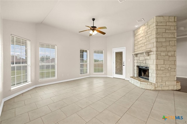 5620 Drystone Ln, Killeen, TX 76542 - unfurnished living room with a ceiling fan, plenty of natural light, baseboards, and light tile patterned flooring