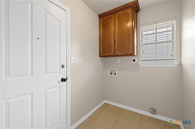 5620 Drystone Ln, Killeen, TX 76542 - laundry room featuring baseboards, cabinet space, hookup for a washing machine, hookup for an electric dryer, and light tile patterned flooring