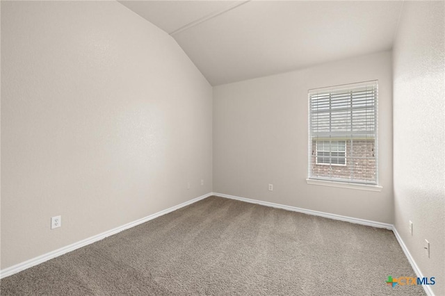 5620 Drystone Ln, Killeen, TX 76542 - unfurnished room featuring vaulted ceiling, carpet, and baseboards