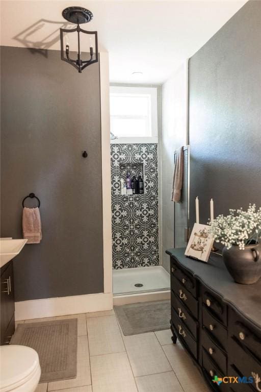 403 E 13th St, Shiner, TX 77984 - full bath featuring a shower stall, vanity, and tile patterned floors