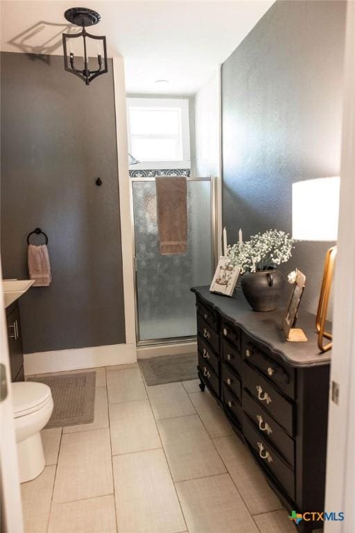 403 E 13th St, Shiner, TX 77984 - full bath with a stall shower, vanity, and tile patterned flooring