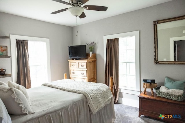 403 E 13th St, Shiner, TX 77984 - carpeted bedroom with ceiling fan