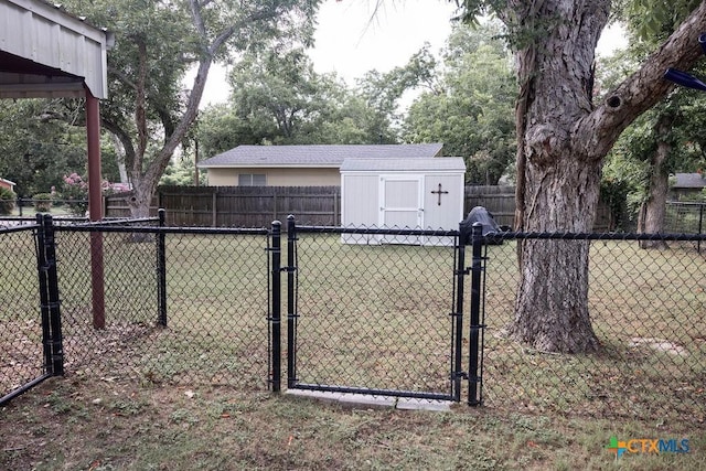 403 E 13th St, Shiner, TX 77984 - view of yard with a gate and a shed