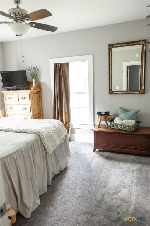 403 E 13th St, Shiner, TX 77984 - carpeted bedroom featuring a ceiling fan