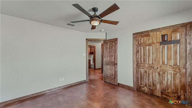 unfurnished bedroom with a closet, a textured ceiling, and ceiling fan