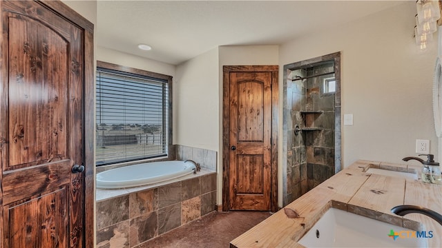 bathroom with shower with separate bathtub and vanity