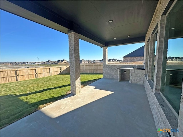 view of patio with exterior kitchen