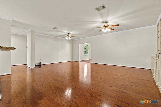 unfurnished living room with ceiling fan, dark hardwood / wood-style floors, and ornamental molding