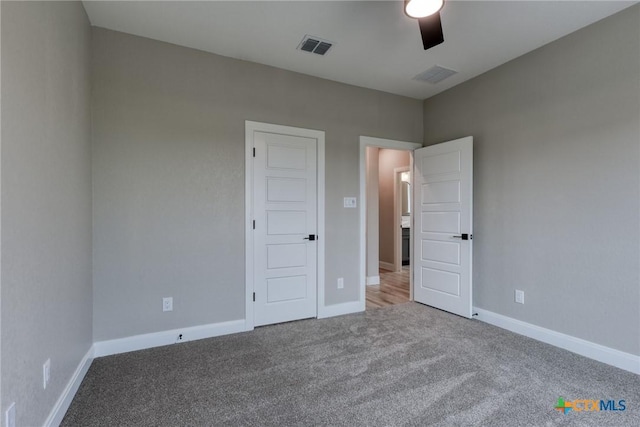 109 Wild Persimmon Trl, Marion, TX 78124 - unfurnished bedroom featuring carpet flooring and ceiling fan
