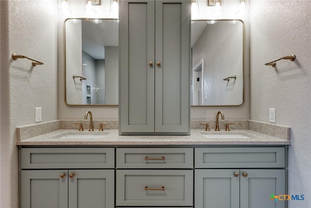 109 Wild Persimmon Trl, Marion, TX 78124 - bathroom with double vanity and a textured wall