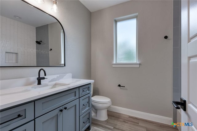 109 Wild Persimmon Trl, Marion, TX 78124 - bathroom featuring vanity, wood finished floors, and a shower
