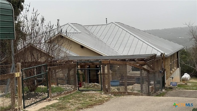 view of front of house with metal roof