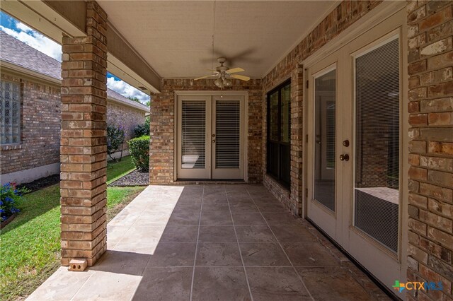 view of patio featuring french doors and ceiling fan