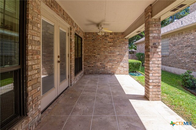 view of patio featuring ceiling fan and french doors