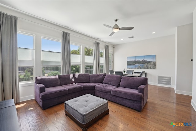 5401 Joe Sayers Ave Unit B, Austin, TX 78756 - living area featuring visible vents, ceiling fan, hardwood / wood-style floors, and baseboards
