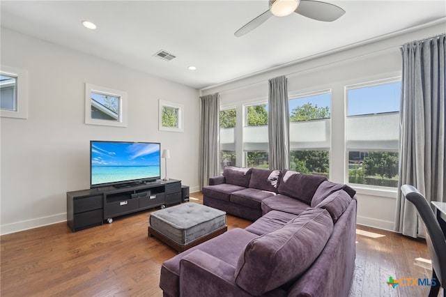 5401 Joe Sayers Ave Unit B, Austin, TX 78756 - living room with plenty of natural light, visible vents, hardwood / wood-style flooring, and baseboards