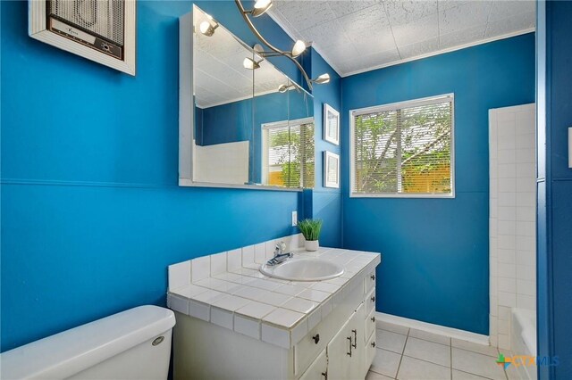 284 Lake Frst, Canyon Lake, TX 78133 - bathroom featuring toilet, vanity, tile patterned flooring, and bathing tub / shower combination