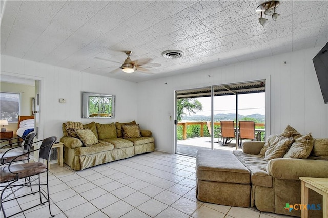 284 Lake Frst, Canyon Lake, TX 78133 - living room with a ceiling fan and light tile patterned flooring