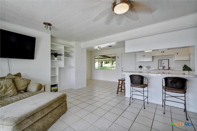 284 Lake Frst, Canyon Lake, TX 78133 - living area featuring light tile patterned floors