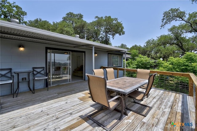284 Lake Frst, Canyon Lake, TX 78133 - wooden terrace with outdoor dining space