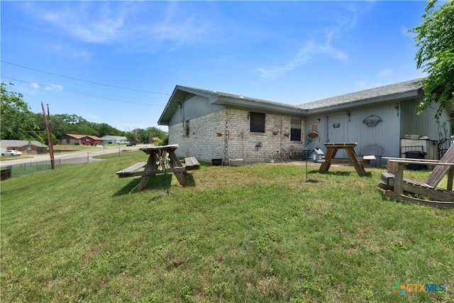 502 Geri Dr, Copperas Cove, TX 76522 - rear view of property featuring brick siding