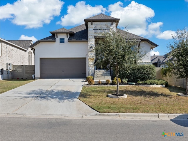 514 Orchard Way, New Braunfels, TX 78132 - french country home featuring concrete driveway, a garage, stucco siding, roof with shingles, and stone siding