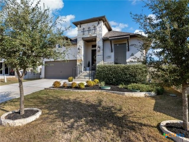 514 Orchard Way, New Braunfels, TX 78132 - view of front of home with concrete driveway, a front lawn, and stucco siding