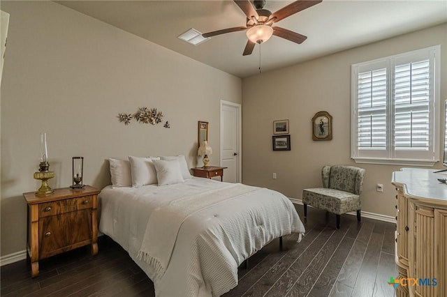 bedroom featuring dark wood-type flooring and ceiling fan