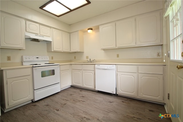 kitchen with white cabinets, light wood-type flooring, white appliances, and sink