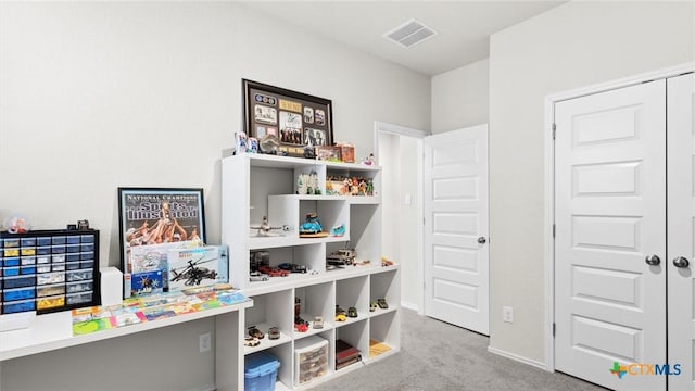 playroom with light colored carpet