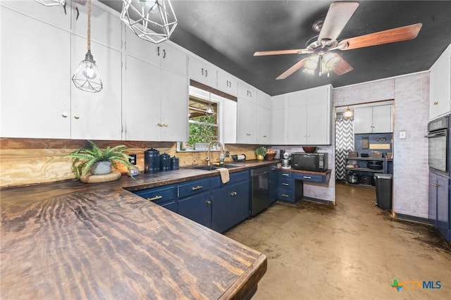 kitchen featuring a sink, concrete flooring, black appliances, dark countertops, and blue cabinets