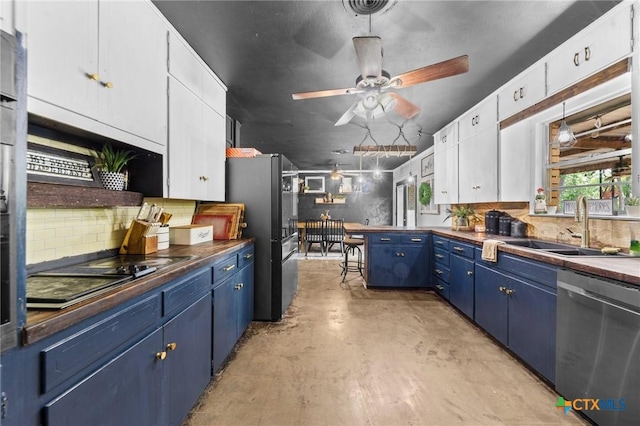 kitchen with white cabinetry, a sink, concrete floors, blue cabinets, and black appliances