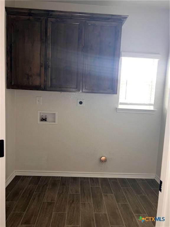 806 Dred Roger Cir, Killeen, TX 76542 - laundry room with wood finish floors, hookup for a washing machine, hookup for an electric dryer, and cabinet space