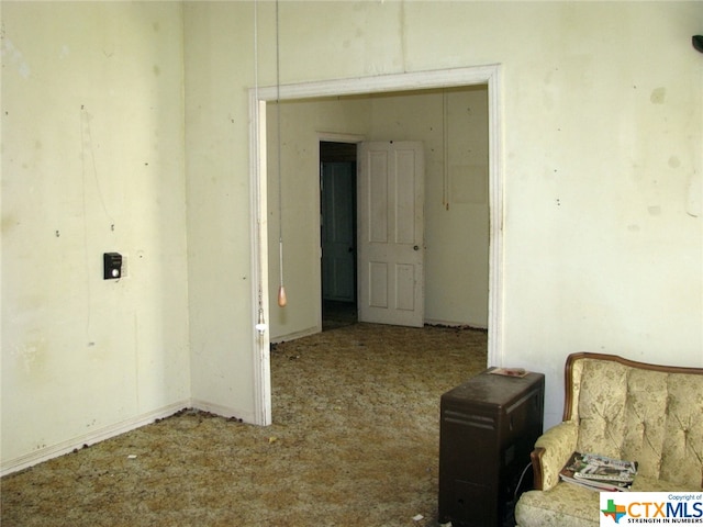 interior space featuring light colored carpet