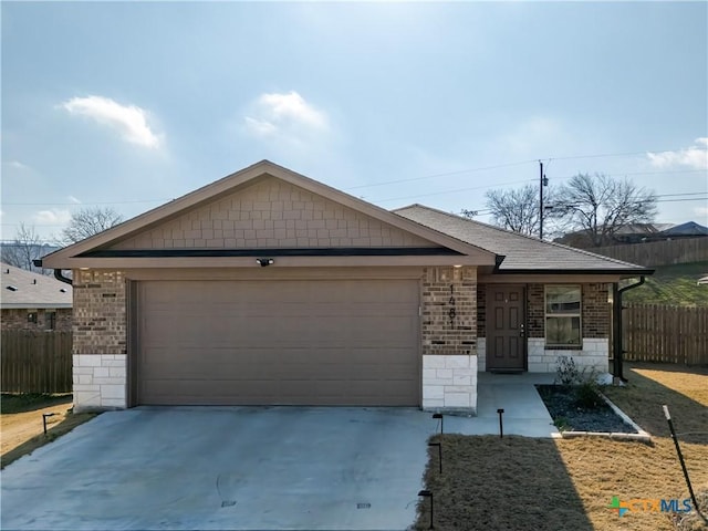 ranch-style home featuring a garage