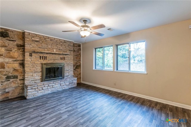 1104 Robindale Dr, Killeen, TX 76549 - unfurnished living room featuring ceiling fan, dark wood finished floors, baseboards, and a fireplace