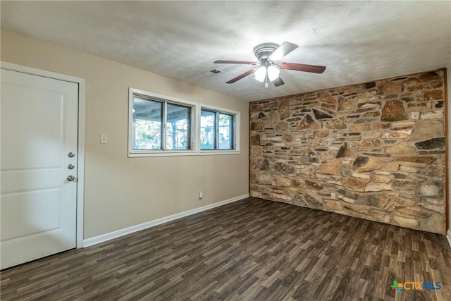 1104 Robindale Dr, Killeen, TX 76549 - unfurnished room featuring a ceiling fan, dark wood-type flooring, and baseboards