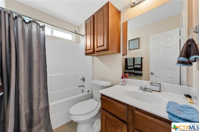 full bathroom featuring toilet, vanity, tile patterned floors, and shower / bathtub combination with curtain