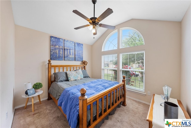 bedroom with vaulted ceiling, light carpet, and ceiling fan