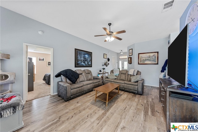 living room featuring light wood-type flooring and ceiling fan