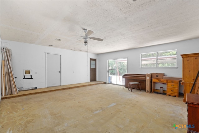 405 Carothers St, Copperas Cove, TX 76522 - miscellaneous room with ceiling fan and a textured ceiling